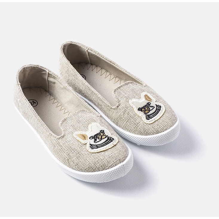 Gråa barnsneakers med Naomi applikation 1