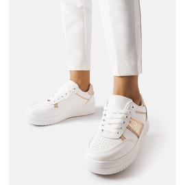 Vita och guld sport sneakers från Parma 1