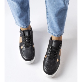 Svarta och guldiga sportsneakers från Parma 1