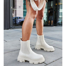 Krämfärgade ankelstövlar med gummiinlägg D'Isola beige 2