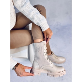 Arbetare med en flexibel Calling Beige ovandel 1