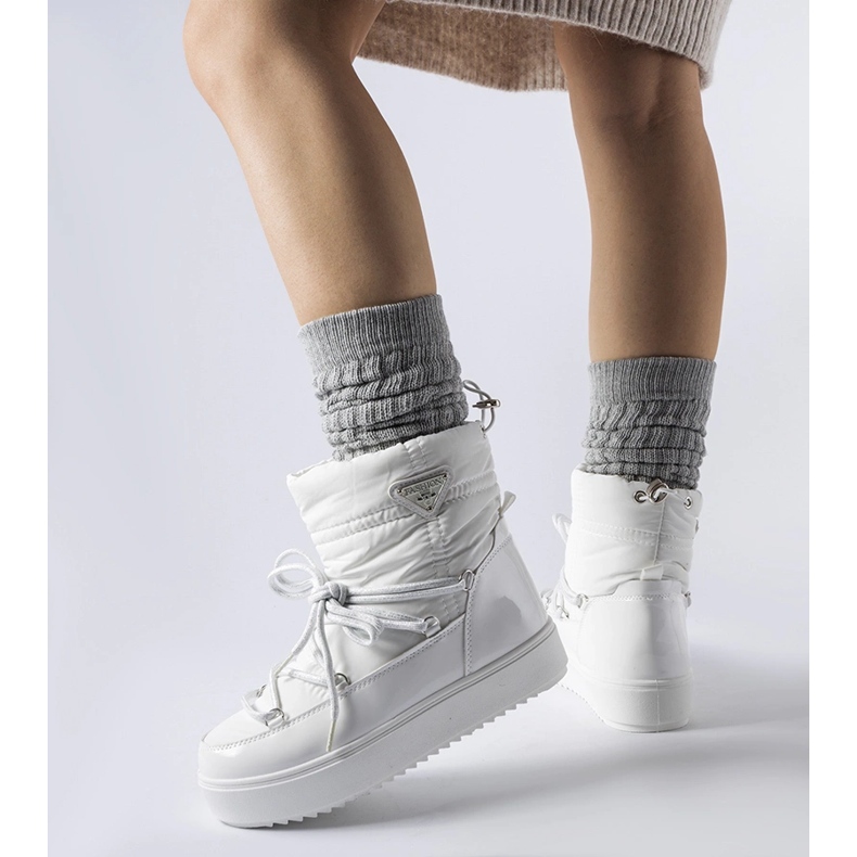 Vita isolerade snöstövlar med resår Oslavia 1