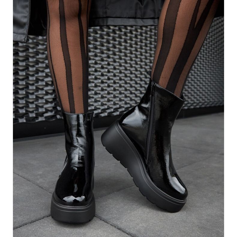 Svarta, isolerade kilstövlar 1