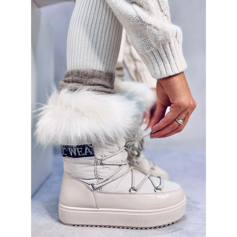 Kendals snöstövlar i beige päls 1