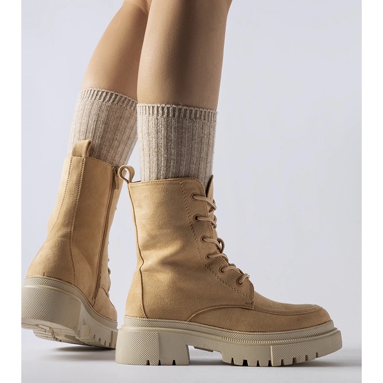 Bruna stövlar med massiv Riel-sula 1