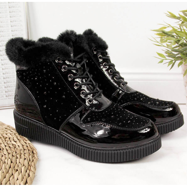 Svarta Rieker 93312-00 läderisolerade läderstövlar på plattformen 1