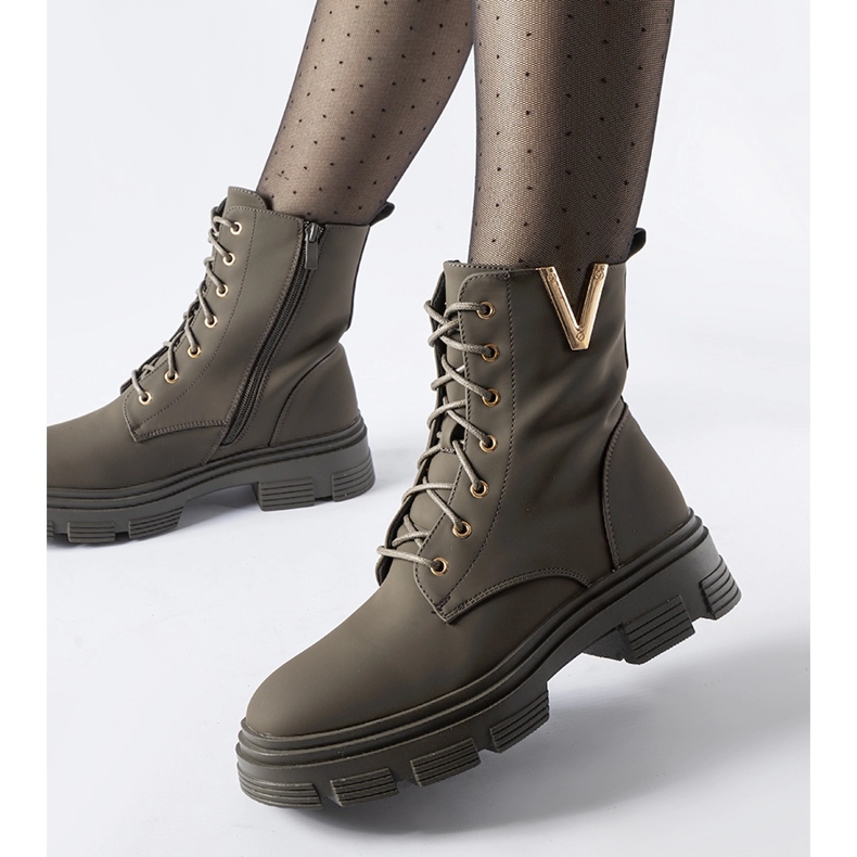 Mörkgröna isolerade matta Fru fotkängor 1