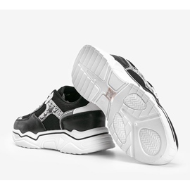 Svarta sneakers med en tjock sula med ett ormskinnsmönster Anika 1