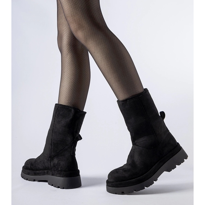 Svarta isolerade stövlar med massiv Flavia-sula 1