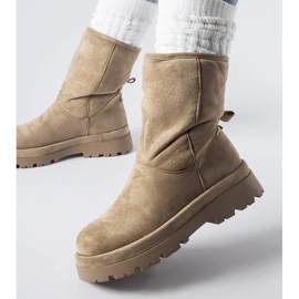 Bruna isolerade stövlar med massiv Flavia-sula 1