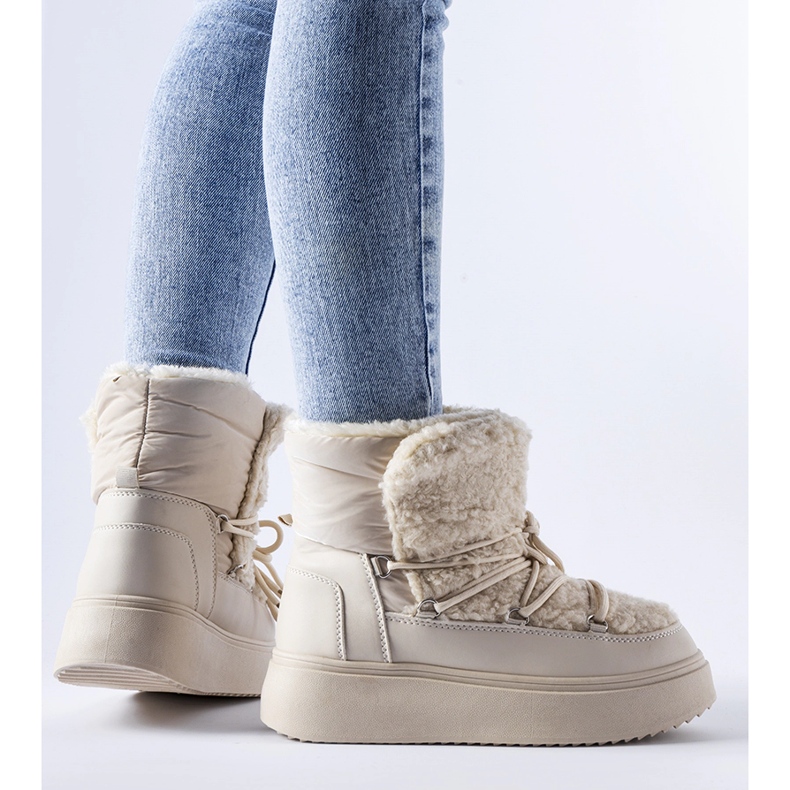 Beige snökängor på en massiv Elvio-plattform 1