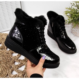 Isolerade ankelstövlar i läder på Rieker W 93312-plattformen, svarta 1