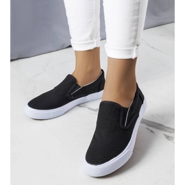 BM Svarta slip-on sneakers i textil från Candace 1