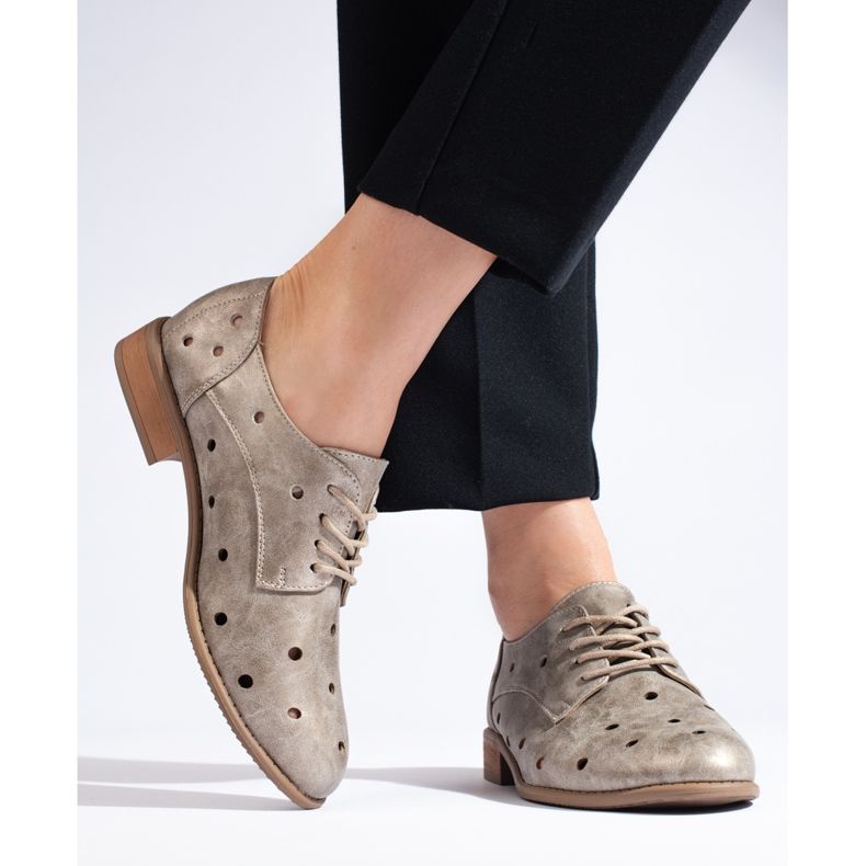 Daszyński genombrutna damskor i guld gyllene 1