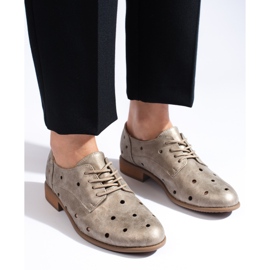 Daszyński genombrutna damskor i guld gyllene 2