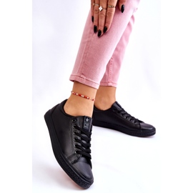 News Kvinnors läderbundna klassiska svarta sneakers 3