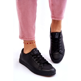 News Kvinnors läderbundna klassiska svarta sneakers 5