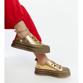 Guldsneakers på GOE NN2N4055-plattformen gyllene 2