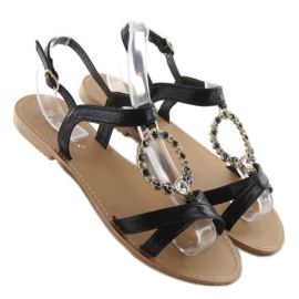 Sandaler med dekorativa svarta stenar 1