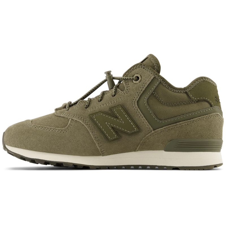 New Balance W JrGV574HG1 isolerade skor grön 1