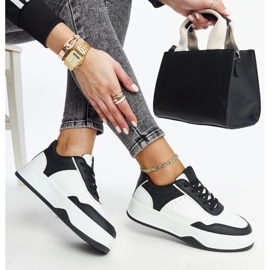 Vita och svarta sneakers med tjock Rumai-sula 1