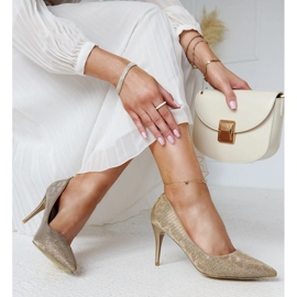 Guldglänsande höga klackar med innersula i läder gyllene 1