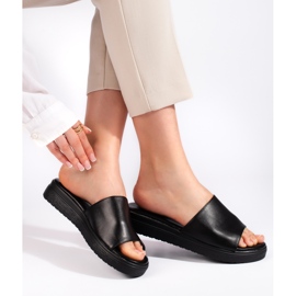 Svarta tofflor för damer 1