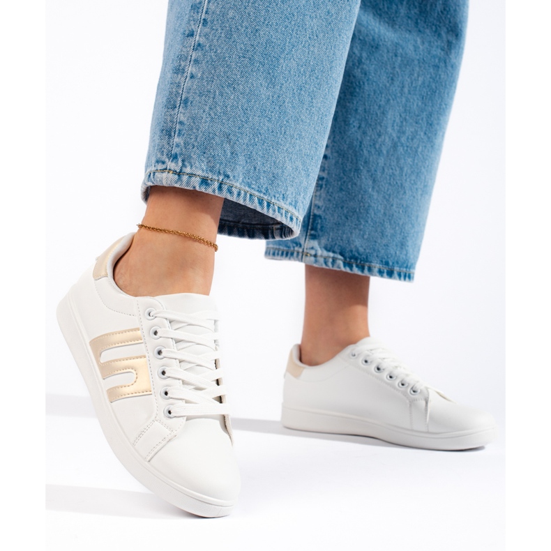 Sneakers för kvinnor i vitt och guld 1