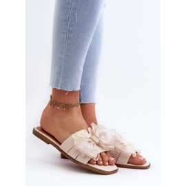 Platta flip-flops för kvinnor med rosett, Beige Balinda 2