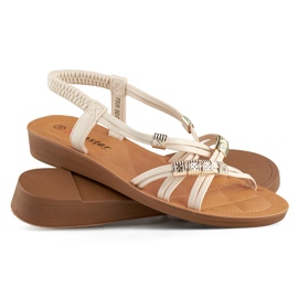 Beige damsandaler med gulddekor 1