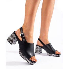 Svarta snygga högklackade sandaler från Sergio Leone 1