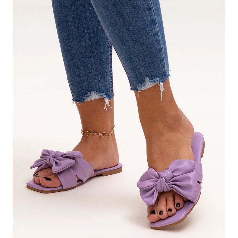 Lila flipflops med dekorativ rosett från Uwansa purpur 1