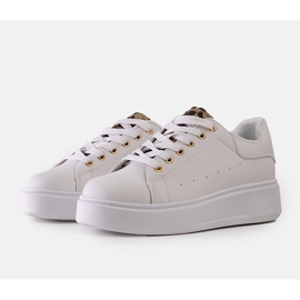 Vita sneakers med iögonfallande Asmait-dekoration 1