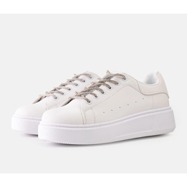Vita sneakers med iögonfallande Asmait-dekoration 1