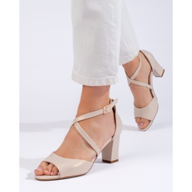 Eleganta guldsandaler med band från Sergio Leone gyllene 1