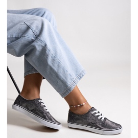 Svarta glänsande Carroline sneakers 1