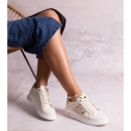 Beige sneakers dekorerade med Xarles-rhinestones 1