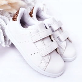 Barns vita och gyllene sneakers 1