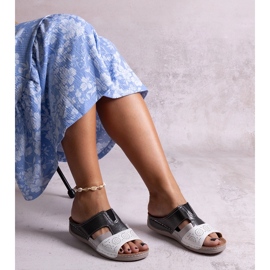 Vita och svarta blanka Saminar flip-flops 2