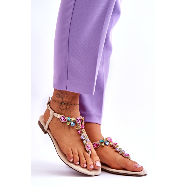 Flip-flopsandaler i beige mocka med stenar 4