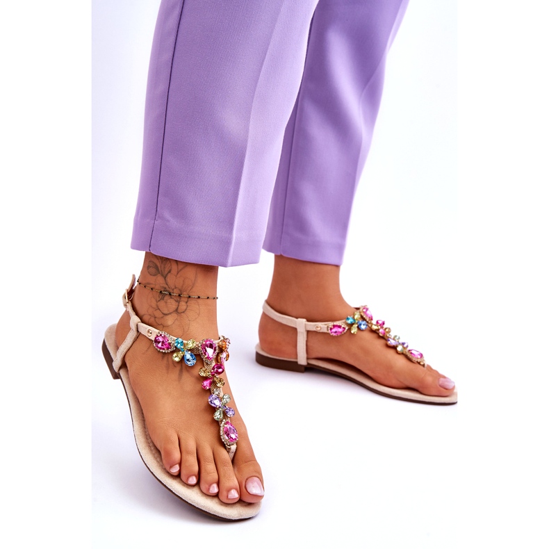 Flip-flopsandaler i beige mocka med stenar 1