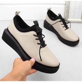 Slip-on skor i beige läder för kvinnor T.Sokolski J23-705 1