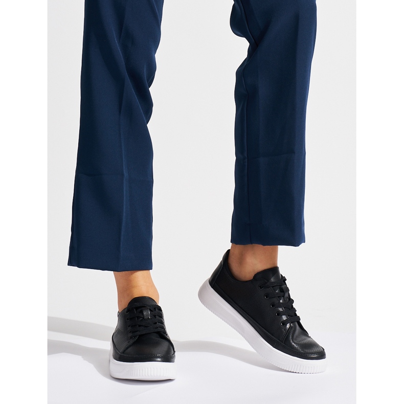 Genombrutna svarta sneakers i läder från Sergio Leone 2