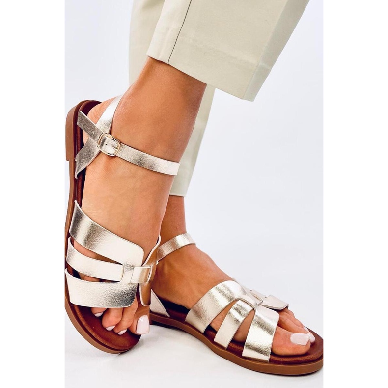 Platta damsandaler i guld gyllene 1