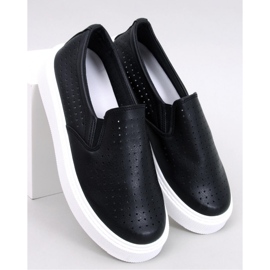 Svarta genombrutna slip-on sneakers 1