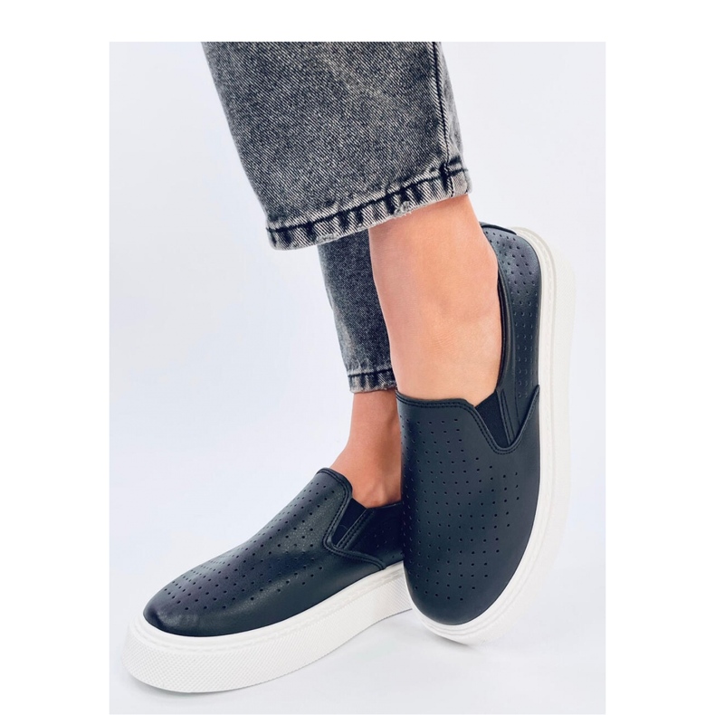 Svarta genombrutna slip-on sneakers 2