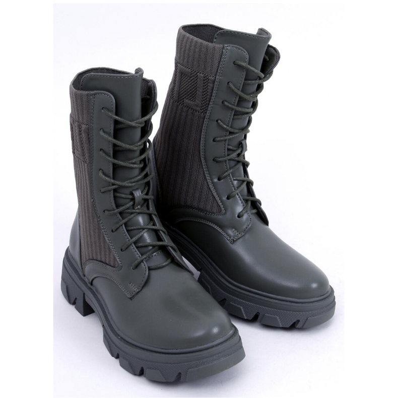 Arbetare med en flexibel övre Calling Green - Inello grön 1