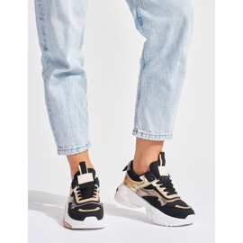 Svarta och guldiga sneakers med tjock sula 1