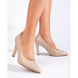 Klassiska dampumps i guld från Sergio Leone gyllene 1