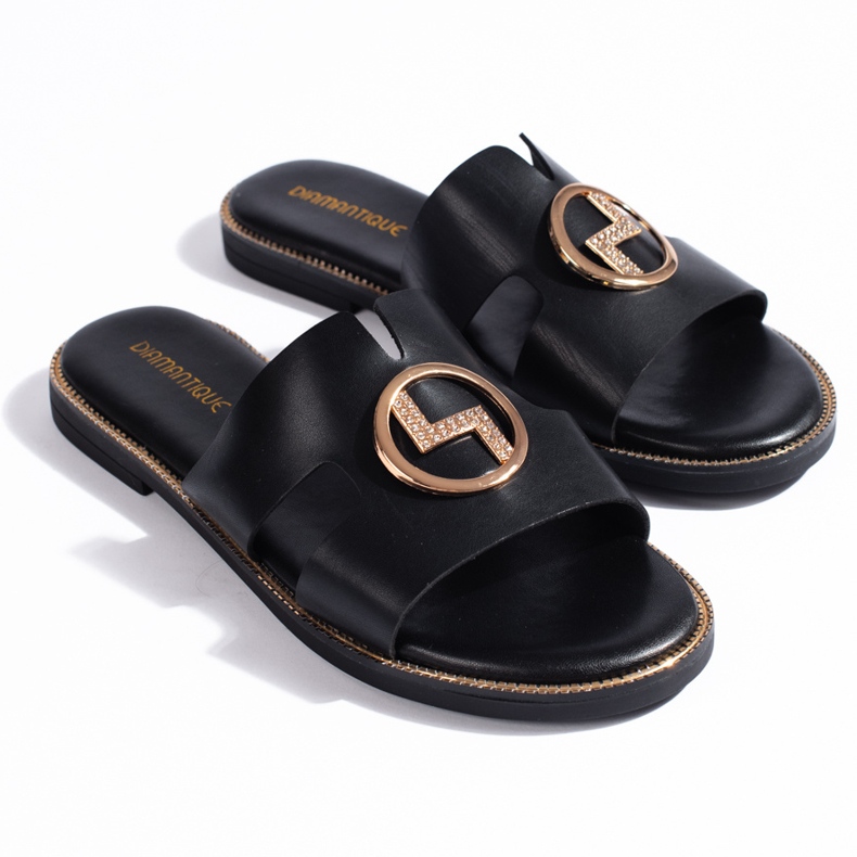 Svarta platta flip-flops med gulddekor 1